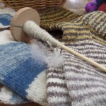 Knitted up yarns and spindle